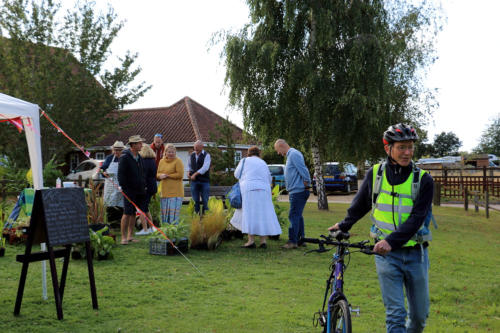 A passing cyclist decides to stop for a cup of tea